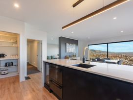A kitchen with a sink and countertop at Nelson Holiday home Nelson