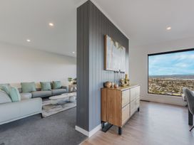 A living room with a sofa and coffee table at Nelson Holiday home in Nelson