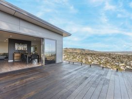 An outdoor deck with a view at Nelson Holiday home in Nelson