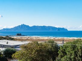 A view of ocean and mountains at Mangawhai Heads in Mangawhai Heads