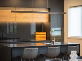 A kitchen with a countertop and sink at Te anau Holiday home in Te Anau