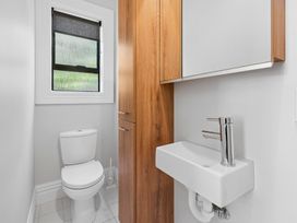 A bathroom with a toilet and sink at The Old Barn in Manchester