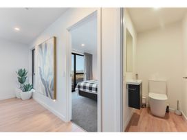 A bathroom with a toilet and sink at Horizon View Retreat - Nelson Holiday Home Nelson