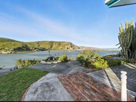 An outdoor area with a river and hills at Birdlings Flat, Banks Peninsula