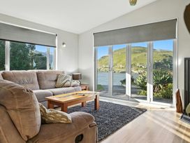 A living room with a sofa and coffee table at Birdlings Flat, Banks Peninsula