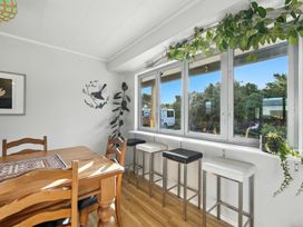 A dining room with a table and chairs at Birdlings Flat, Banks Peninsula