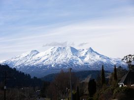A view of a snow-covered mountain range at Ohakune Holiday Home in Ohakune