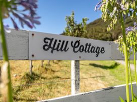 A sign reading Hill Cottage at Hill Cottage - Featherston Holiday Home Featherston