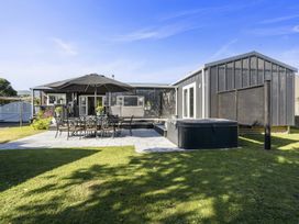 An outdoor seating area with table and chairs at a property