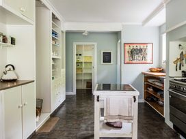 A kitchen with a kettle and kitchen island at Dunluce Coastal Farmstay - Kaikoura