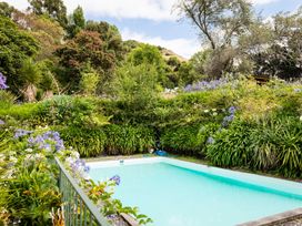 A swimming pool in a garden at Dunluce Coastal Farmstay - Kaikoura