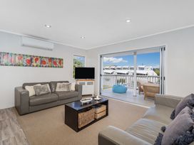 A living room with a sofa and coffee table at the property in the location