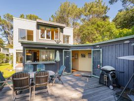 A house with a deck and seating area at 