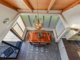 A dining room with a table and chairs at Picton Holiday Home