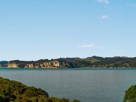 A view of a body of water and cliffs at Bay View Escape - Whitianga Holiday Home, Whitianga