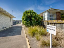 An outdoor parking entrance sign at Duart Haven