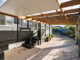 An outdoor area with a staircase and paved pathway at Taupo - Holiday Home