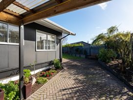 A garden with pathway and plants at Taupo - Holiday Home