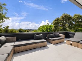 Outdoor seating area with furniture and plants at Paihia, Paihia