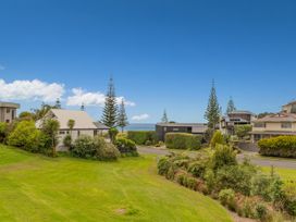 A view of houses and greenery in Whangamata