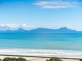 A view of the ocean and islands at Langscape - Langs Beach Holiday Home in Langs Beach