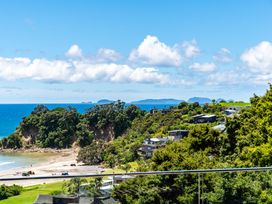 A coastal view with houses and ocean at Langscape - Langs Beach Holiday Home Langs Beach