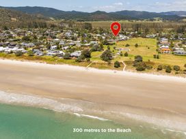 A view of houses and beach area at Sea Breezes - Matarangi Holiday Home Whitianga
