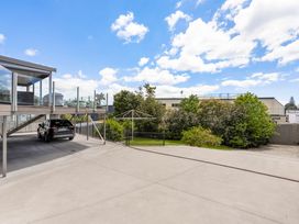 A car parked in the outdoor area at Happy Place - Waihi Beach Holiday Home, Waihi Beach