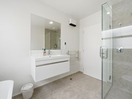 A bathroom with sink and shower at Bliss at Madras - Christchurch Holiday Home