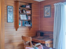 A study with a desk and bookshelf at Coromandel