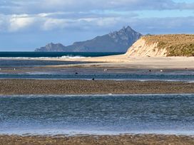 A view of the ocean and mountain at Black Dune in Waipu