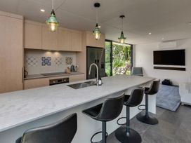 A kitchen with a countertop and appliances at Tutukaka in Whangarei