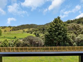 A view of hills and trees from a balcony at Tutukaka in Whangarei