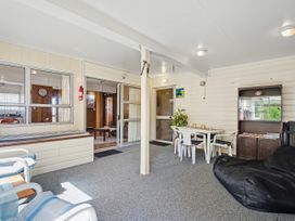 A snug with seating and a table at Whitianga