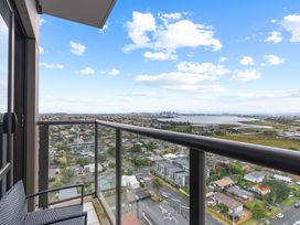 A balcony with a city view at the property in Auckland