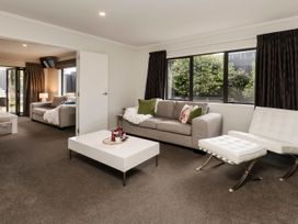A living room with a sofa and coffee table at New Plymouth in New Plymouth
