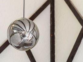 A light fixture on the ceiling at Whangamata