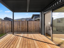 An outdoor space with decking and views of mountains at Sunrise on Vintage - Cromwell