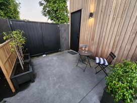 An outdoor space with table and chairs at Studio - Point Wells Holiday Home, Point Wells