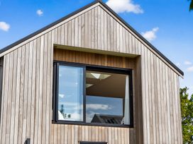 A wooden exterior with a window at The Coastal Studio - Point Wells Holiday Home Point Wells