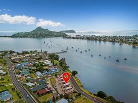 A view of houses and a waterway at Waterfront Bliss - Tairua Holiday Home, Tairua