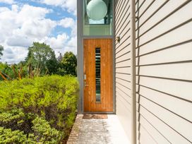 A front door and pathway at Lake Taupo Holiday Home in Taupo