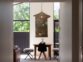 A living room with a table and chairs at Sunderland Views - Clyde Holiday Home Clyde
