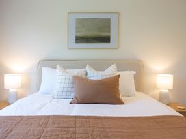 A bedroom with a bed and pillows at Sunderland Views - Clyde Holiday Home, Clyde
