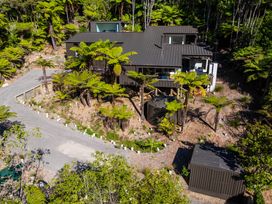 A house with outdoor area and pathway at Nature's Luxe - Moetapu Bay Holiday Home in Picton