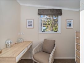 An office with a desk and chair at Little Tui Ridge - Coromandel Holiday Home, Coromandel