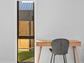 An office with a desk and a chair at Cromwell Holiday Home in Cromwell