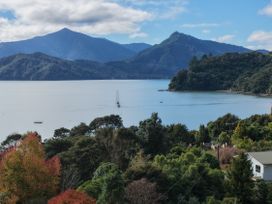A view of water and mountains at The Sounds Hideaway - Moetapu Bay