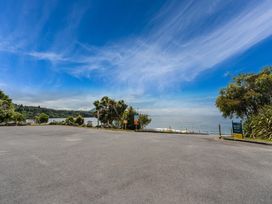 An outdoor area with a view of the ocean at Hauraki Haven - Lake Taupo Holiday Home, Pukawa