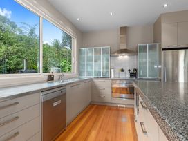 A kitchen with countertops and appliances at Langs Beach Holiday Home in Langs Beach